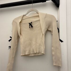 Cream Ribbed Long Sleeve Top with Black Bow Detail